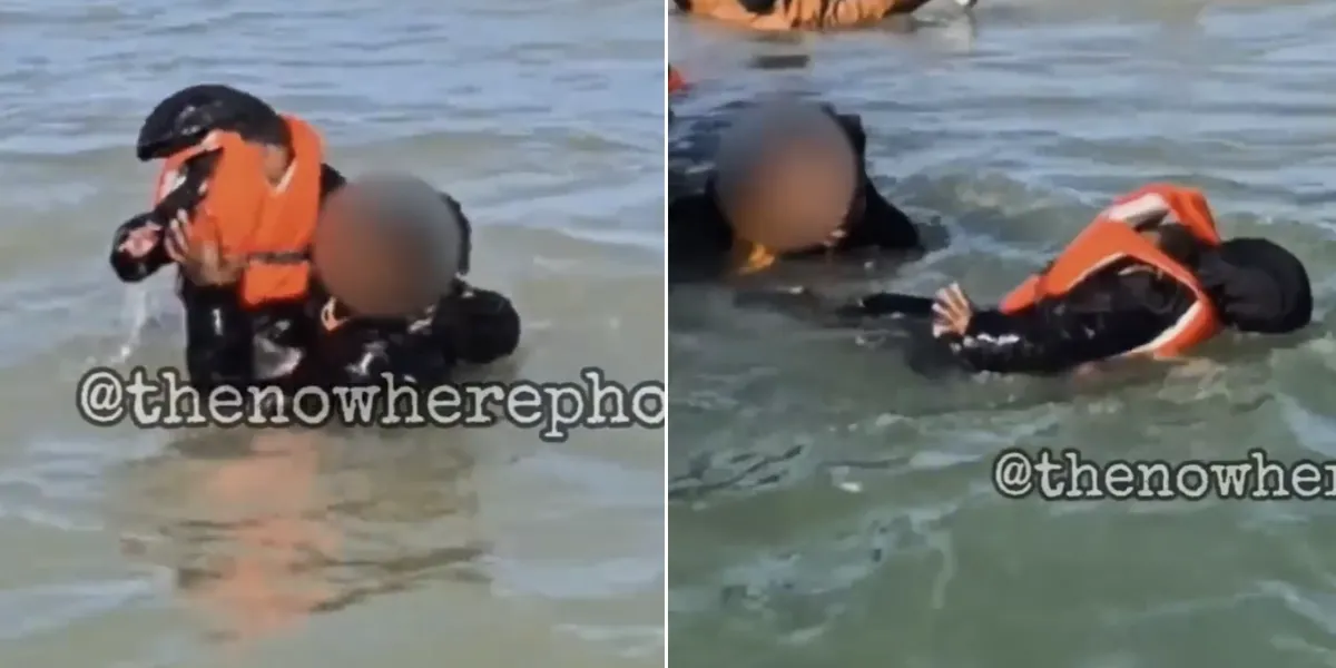 Migrant abandons toddler in water as he scrambles to climb onto overcrowded dinghy bound for Britain